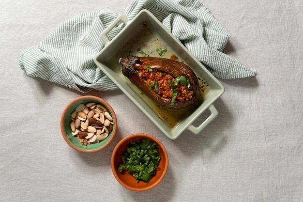 Free photo top view delicious eggplants dish still life