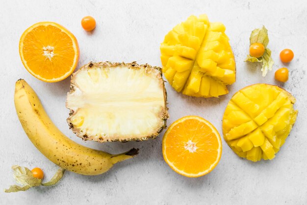 Top view delicious exotic fruits on the table