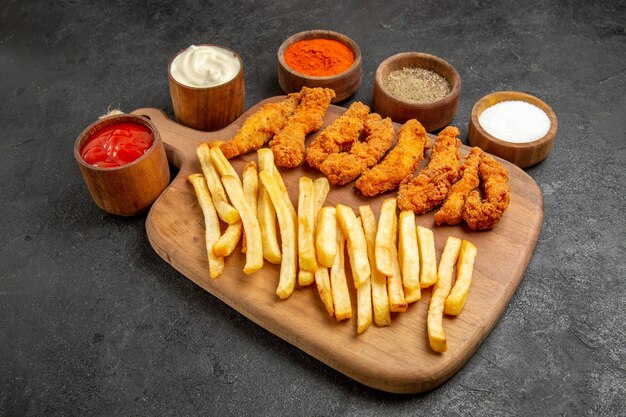 Top view of delicious fried chicken with french fries