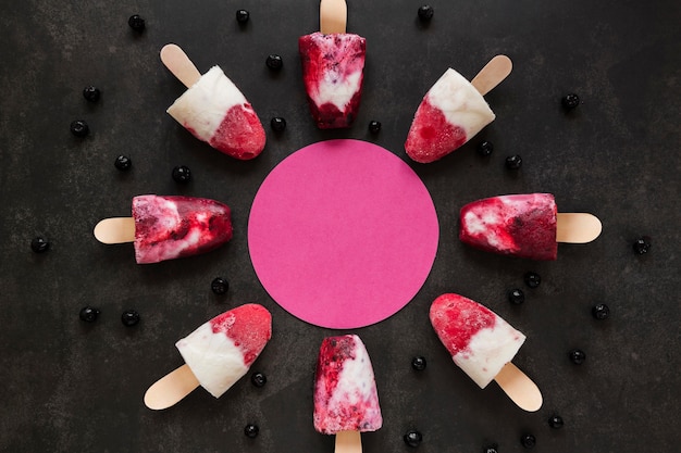 Top view of delicious fruity popsicles