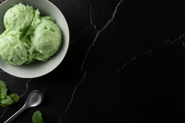 Free photo top view delicious green ice cream still life