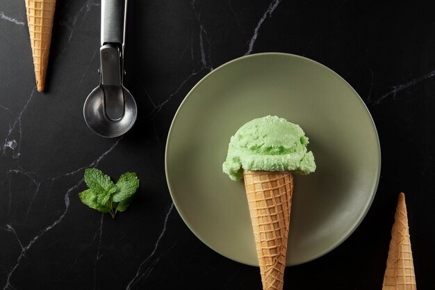 Top view delicious green ice cream still life