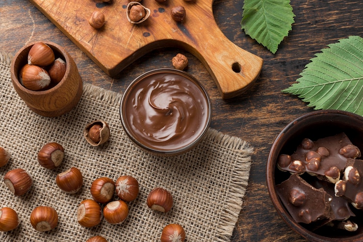Free Photo top view of delicious hazelnut chocolate