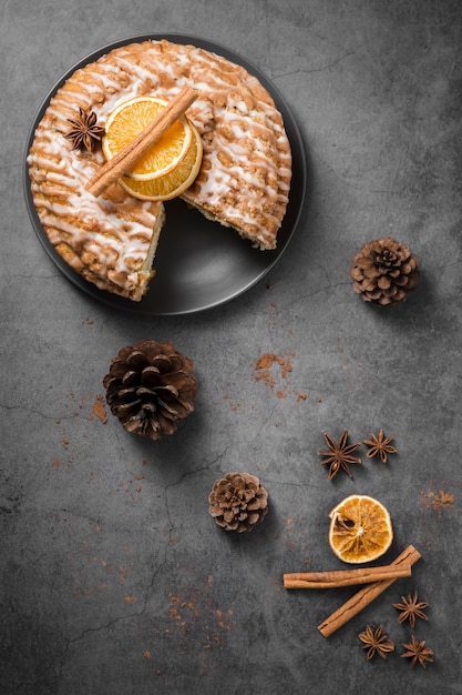 Top view delicious homemade cake with pine cones