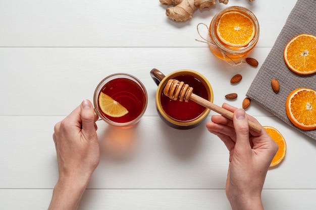 Top view delicious honey with orange slices