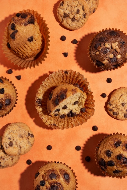 Free photo top view delicious muffins arrangement