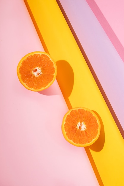 Free photo top view delicious orange slices