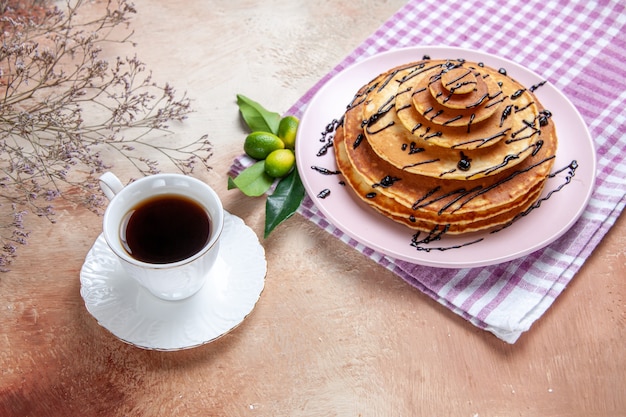 Top view on delicious pancakes with various ingredients