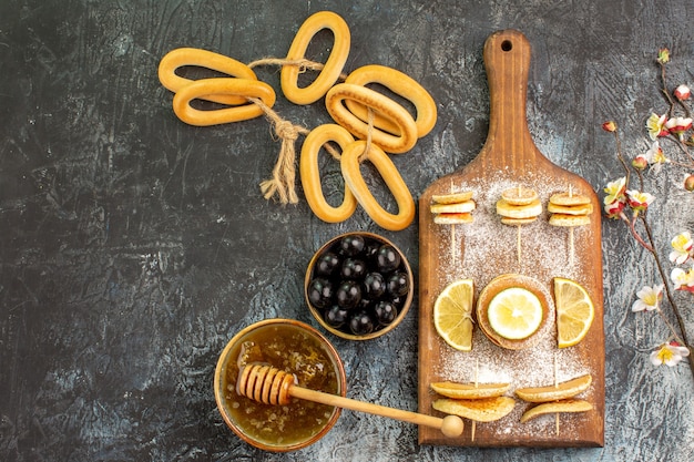 Top view on delicious pancakes with various ingredients