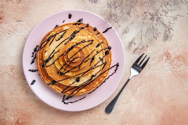 Free photo top view on delicious pancakes with various ingredients