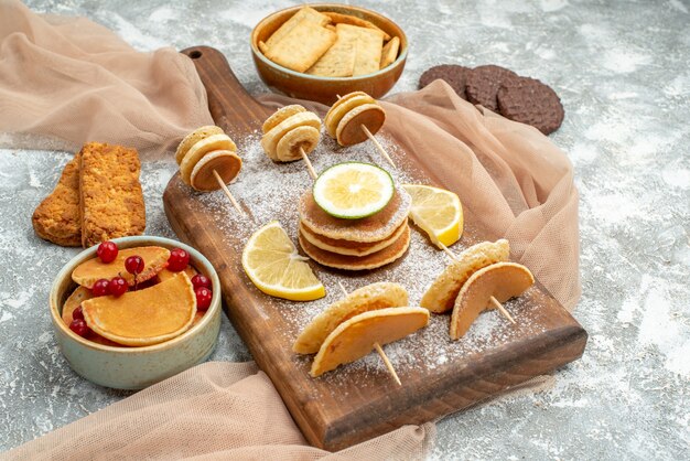 Top view on delicious pancakes with various ingredients