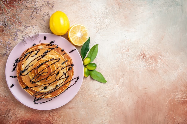 Free photo top view on delicious pancakes with various ingredients