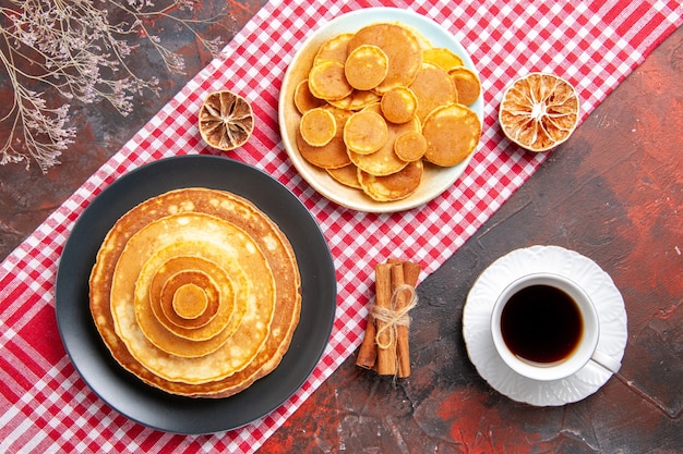Top view on delicious pancakes with various ingredients