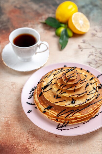 Top view on delicious pancakes with various ingredients