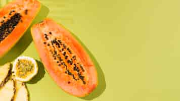 Free photo top view delicious papaya fruit with copy space