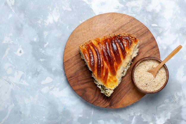 Top view delicious pastry slice baked on light-white background.