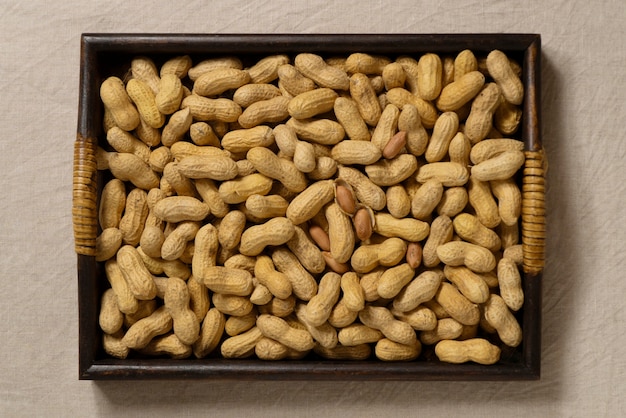 Free photo top view delicious peanuts arrangement