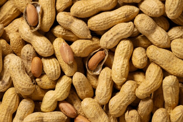 Free photo top view delicious peanuts arrangement