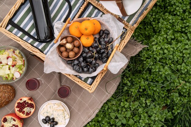 Top view delicious picnic snacks