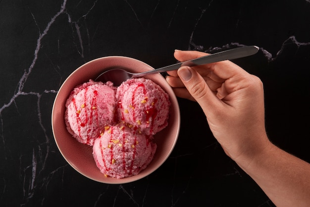 Top view delicious pink ice cream still life