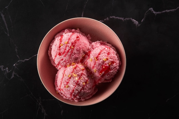 Top view delicious pink ice cream still life