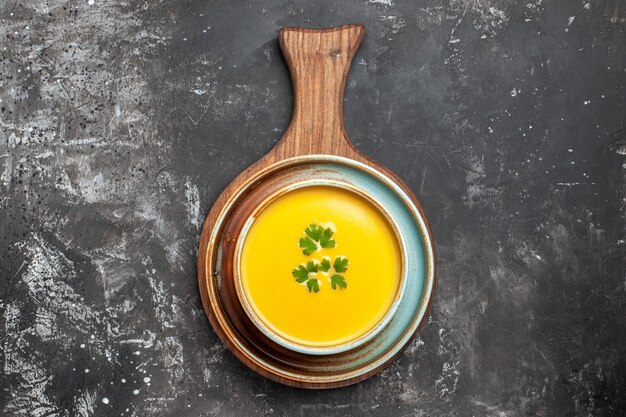 Free photo top view of delicious pumpkin soup in a bowl