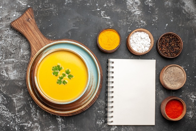 Free photo top view of delicious pumpkin soup in a bowl