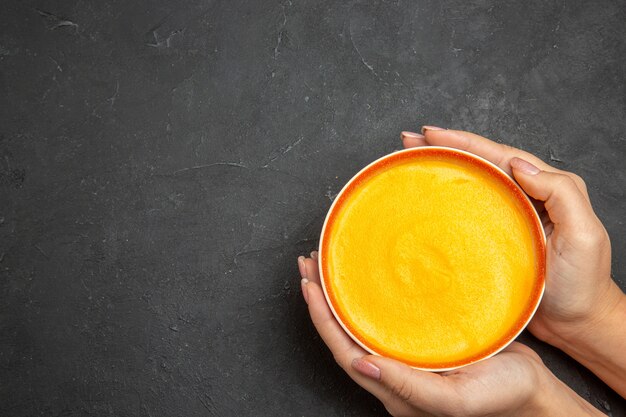 Top view of delicious pumpkin soup in a bowl