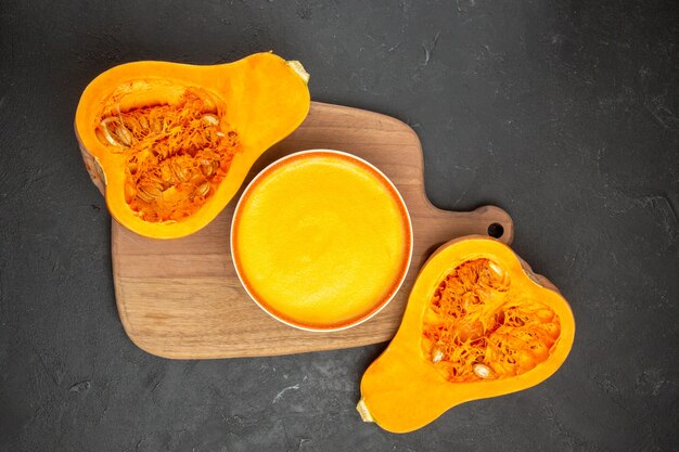 Free photo top view of delicious pumpkin soup in a bowl