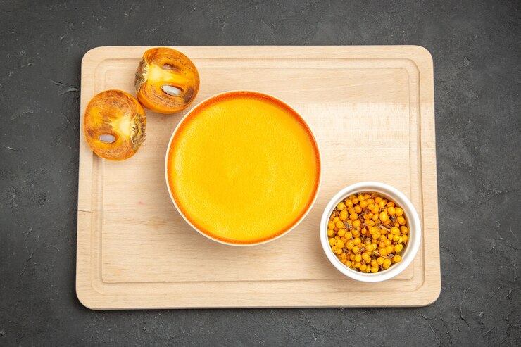 Free Photo top view of delicious pumpkin soup in a bowl