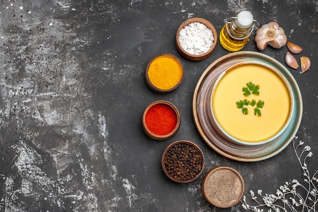 Free photo top view of delicious pumpkin soup in a bowl