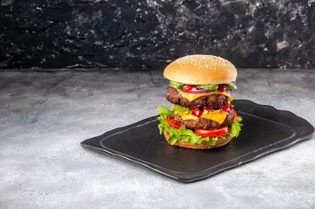 Top view of delicious sandwich on the left side on gray ice distressed isolated surface