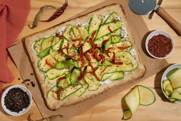 Free photo top view delicious square pizza with pepper