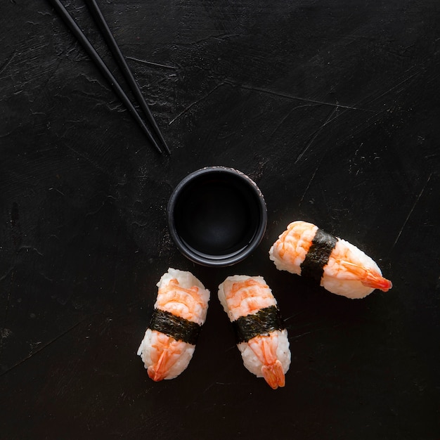 Free photo top view of delicious sushi with copy space