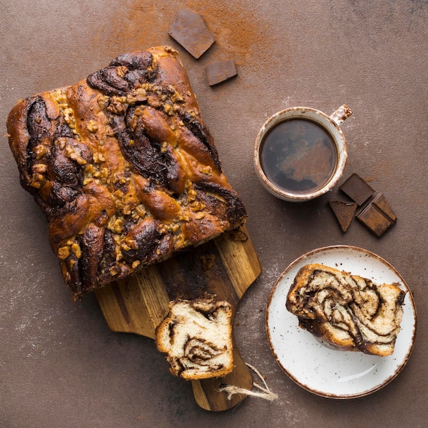 Top view of delicious sweet bread with coffee