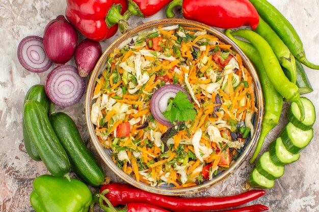 Top view of delicious vegan salad with various vegetables