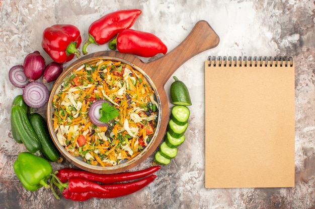 Top view of delicious vegan salad with various vegetables