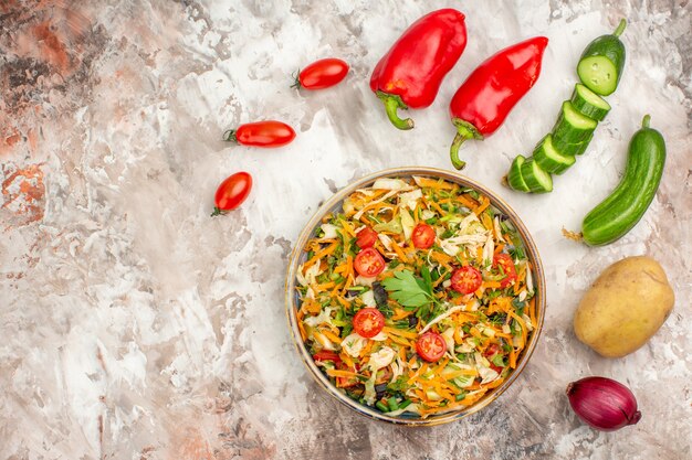 Free photo top view of delicious vegan salad with various vegetables