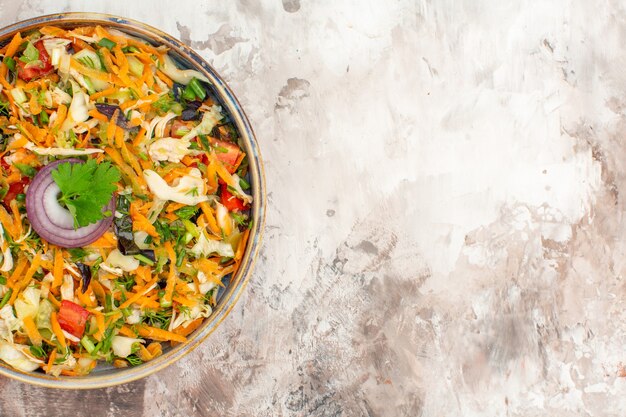 Top view of delicious vegan salad with various vegetables