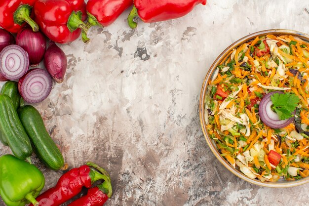 Top view of delicious vegan salad with various vegetables