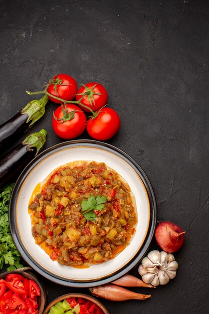 Top view delicious vegetable meal sliced cooked dish with fresh vegetables on grey surface meal dinner sauce food soup vegetables