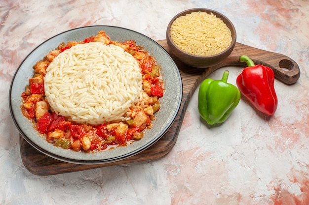 Top view of delicious white rice meal with chicken and vegetables