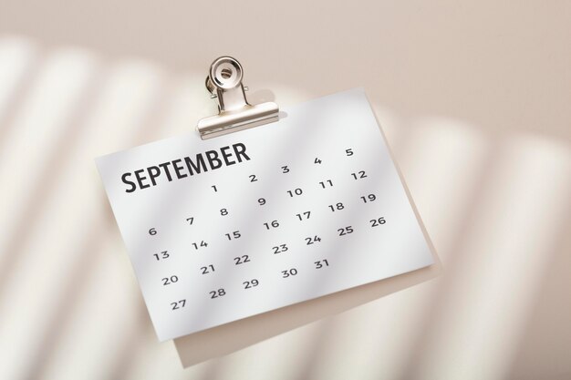 Top view desk arrangement  with calendar