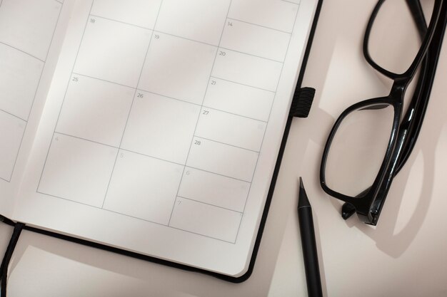 Top view desk arrangement with glasses