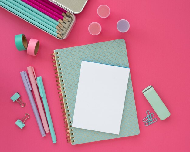 Top view desk arrangement with notebook