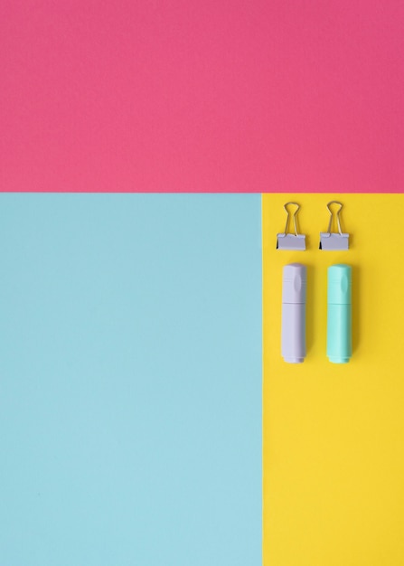 Top view desk arrangement with paper clips