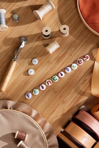 Top view desk arrangement with sewing objects