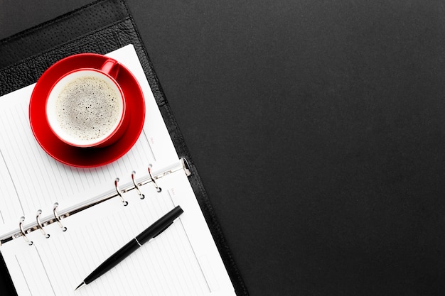 Top view desk concept with coffee