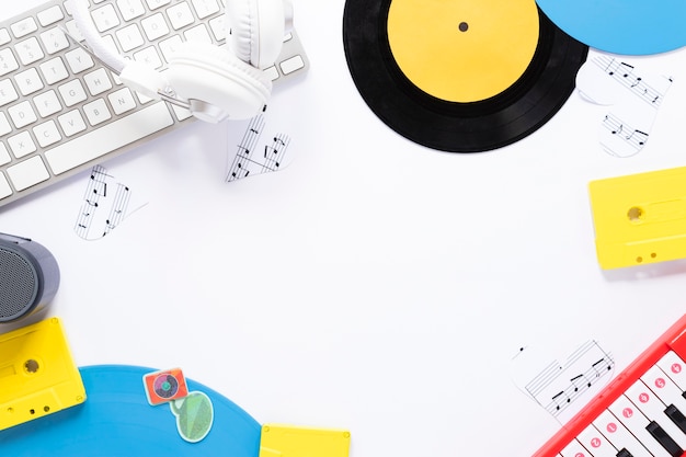 Top view desk concept with musical theme