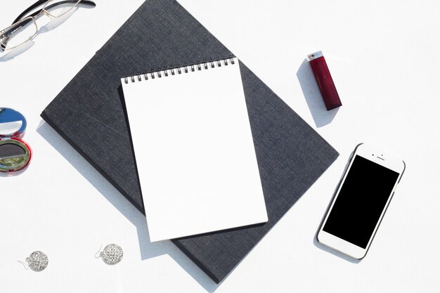 Top view desk concept with notepad